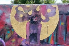 Art urbain de Demoiselle MM avec la fresque "Demoiselle Horus".