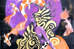 Fresque de street art inspirée par la déesse égyptienne Sekhmet.