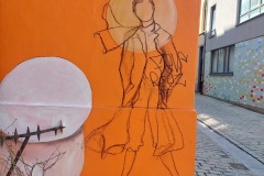Fresque murale représentant Demoiselle TinTine dans le quartier d'Ixelles à Bruxelles