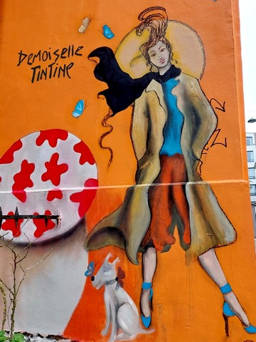 Peinture murale Street art Urbain Tintin Demoiselle TinTine à Bruxelles